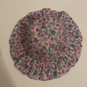 The Children Place bucket hat. Size XS / S (6 to 24 months). Floral, ruffle brim